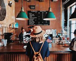 This coffee shopping guide compares arabica and robusta coffees, describes how coffee is grown, harvested, and roasted, and provides links to gourmet coffee shops and coffee roasters. Hipster Coffee Shop Dictionary Com