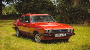 Image result for Bright Red 1980 Capri