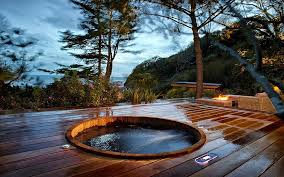 We took time and effort to drop it into the landscape and rock around it so it is beautiful. Making A Custom Hot Tub Enclosure In A Deck