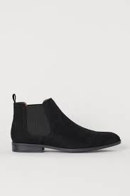 Chelsea boots in suede with elastic gores in the sides and a loop at the back. Chelsea Boots Black Imitation Suede Men H M