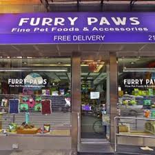 Gate latticework features cute paw prints for a fun, playful design. Furry Paws New York Ny Pet Supplies