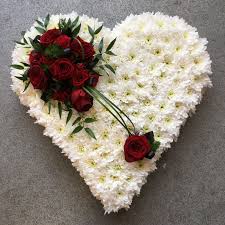 Green and white pillow from £70.00 buy more. White Based Heart With Red Rose Spray Ammiflowersdevizes Funeralflowers Funeral Heart Redroses Funeral Heart Funeral Flower Arrangements Funeral Flowers