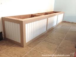 There is always room under those dining table benches. Dining Room Built In Bench With Storage