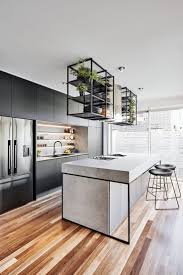 A Modern Industrial Look Was Created For This Townhouse Interior Design Kitchen Kitchen Design Small Modern Kitchen