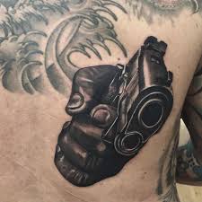 In character tattoos, tattoo ideas, tattoo trends 2018. 40 Awesome Pistol Gun Tattoos Design Ever Made