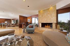 In the process of removing the wall, chip gaines found the original fireplace underneath, and decided to keep it as a unique design element. Mid Century Masterpiece Alvarado Estates Midcentury Living Room San Diego By Neuman Neuman Real Estate Inc Houzz