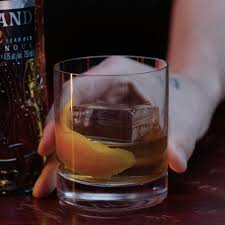 He poured one glass of a normal old fashioned, drizzled over a perfect ball of ice and served right away. How To Master A Smoked Old Fashioned At Home Eater
