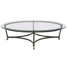 Brass Heavy Glass Oval Hoof Foot Coffee Table Regency Modern La Barge From A Unique Collection Of A Oval Glass Coffee Table Glass Coffee Table Coffee Table Sulta oval coffee table, brass & black ombre.