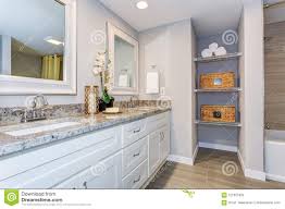elegant bathroom with long white vanity