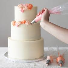 20 of the most beautiful homemade cake decorating ideas. 4 Easy Ways To Diy A Wedding Cake Brit Co