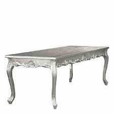 Curved flower glass centerpiece on a cherrywood dining table. Baroque Dinner Table Silver 160cm