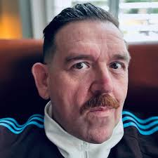 Feeling fine after a fresh fade and a wet shave.