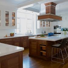 This open concept cottage style kitchen offers colorful yellow and blue painted shaker style cabinets to give a coastal vibe to the space. 75 Beautiful Coastal Kitchen With Dark Wood Cabinets Pictures Ideas June 2021 Houzz