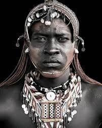 TURKANA COMMUNITY FROM KENYA. The Turkana are believed to have migrated  from southern Sudan and settled around Lake Turkana, where they mainly kept  their livestock. Those close to lake Turkana and river