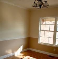 If left to their own devices, chairs would dent up all of your walls and make you mad. Different Color Above And Below Chair Rail Home New Homes Living Room Colors