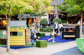 Australian retail building in maribyrnong design by grimshaw / the buchan group, architects. Families Children Highpoint Shopping Centre Melbourne