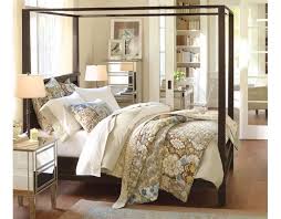 A grand canopy bed designed by architect michele bonan emphasizes the high ceilings of a bedroom in an apartment in a historic palazzo in florence. Like This Quilt For The Colors And Pattern Probably Too Brown But I Think A Quilt Is The Right Fe With Images Farmhouse Canopy Beds Home Bedroom Bedroom Design