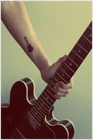 However, this one is a smaller tattoo which you can easily place. 25 Creative Guitar Tattoo Designs Guitar Tattoo Guitar Tattoo Design Music Tattoo Designs