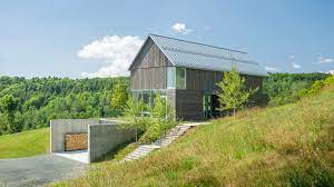 We first reported on the balancing barn back when it was. Birdseye Design Integrates Bank Barn House Into Vermont Hillside