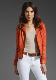This Leather Jacket Adds The Perfect Edge To A Simple Outfit Orange Leather Jacket Simple Outfits Leather Jacket Outfits