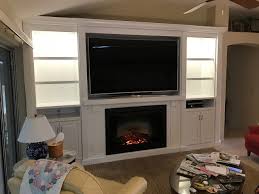 They can fill a bland space with character and give a mismatched space a sense of cohesive identity. White Tv Wall Unit With Fireplace Novocom Top