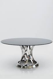 The rectangle table shape will easily fit in your dining room. 10 Black Glass Dining Room Table Ideas Dining Room Table Dining Glass Dining Room Table