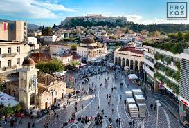 The area is home to clothing boutiques, souvenir shops, and specialty stores, and is a major tourist attraction in athens and attica for bargain shopping. View Of The Acropolis From Monastiraki Athens Framed Photograph By Andrew Prokos