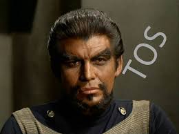 I have a weird question to ask. The disease that phlox is kidnapped and  forced to heal. Is that what they were using to explain why klingons look  so different in TOS? |