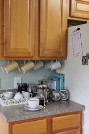 Hang Coffee Cups Under Kitchen Cabinet With Hooks Makes For Extra Space Coffee Bar Home Coffee Bars In Kitchen Kitchen Decor