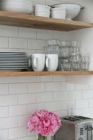 Gorgeous Kitchen With Home Depot Subway Tile Backsplash Framing Stacked Floating Wood Shelves White Subway Tile Subway Tile Kitchen Home Kitchens