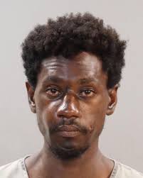 Today's murder victim, **Rasheed "Sonny Boy" Canty.** With a female  relative.