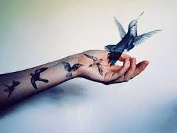 Flying flock these bird tattoo designs are common, but it's all about. Bird Tattoos Interpreted What Various Birds Mean Represent Tatring
