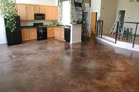 Concrete floor coating types if you want to cover a gray concrete garage floor or basement floor you can choose between a beautifully decorated concrete overlay and epoxy floor paint. How To Stain An Interior Concrete Floor Ehow Concrete Floors Diy Concrete Stained Floors Painted Concrete Floors