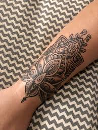 Dotwork and line work partial arm sleeve. Mandala Lotus Wrist Tattoo Mandala Wrist Tattoo Tattoos Sleeve Tattoos For Women