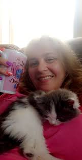 Newfie snuggling by the warm fire in NJ