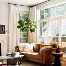 Beautiful Warm Living Room With Cognac Leather Couch Gorgeous Wall Of Windows Beaut Wohnzimmer Braun Braune Wohnzimmermobel Warme Wohnzimmer