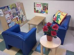 My Classroom Library I Like The Idea Of Using Kid Size Comfy Chairs My Girls Are Small Enough Classroom Decor Classroom Arrangement Preschool Library Area