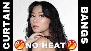 Smooth your bangs to the side. How To Style Curtain Bangs Without Heat Youtube