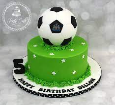 Use tip 16 and white icing to pipe seam on football. Football Cake Design For Boy Novocom Top