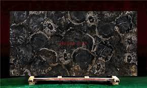 There is no choice but we do guarantee a nice selection, you will receive one slab. China Gemstone Black Petrified Wood Slab China Stone Marble