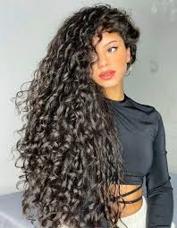 Curls are great for dressing up your look or just being casual. Delightful Style Of Curly Hairstyle For 2021 Young Girls Stylezco