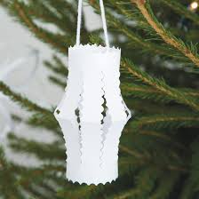 These were created by mint but you could easily make them by cutting christmas shapes out of card stock. How To Make Christmas Decorations Ideal Home