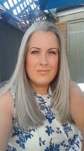 Happy with natural hair after transitioning from coloring for 16 years