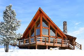 The romance of handcrafted log house plans is revealed in the natural elements and creativity put into the finished log home. Rustic Chalet Log Home Plan By Expedition Log Homes