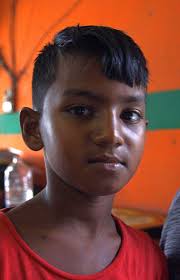 Who took the photo of the orphaned child?