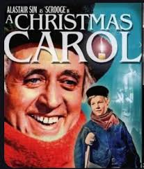 Sid james plays scooge in carry