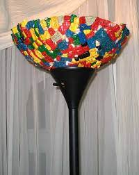 Using any bulb with a low cri (2,700k) will make your lego mood lamp appear yellowish, unlike a 5,000k bulb, with its bright white color that will make your blues look blue and your reds look red. Diy Lego Lamps Hideous Lampshade Made Of Melted Melange Of Toy Bricks