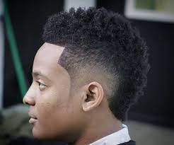 Awesome 60 Sassy Curly Mohawk Designs Outlandish Bad Boy Style Curly Hair Styles Naturally Curly Hair Styles Afro Fade Haircut