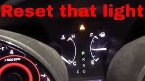 Bought new 50,000 mi.developed humming noise. Toyota Highlander Yellow Triangle With Exclamation Point