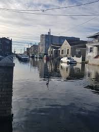 Heavy Rain And High Tides Cause Major Flooding Beach